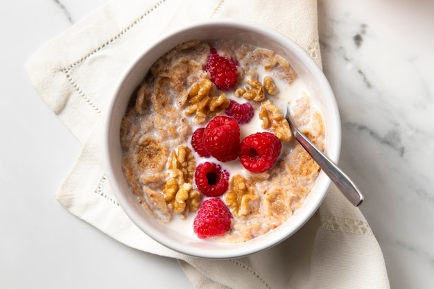 Top view composition of healthy bowl cereals