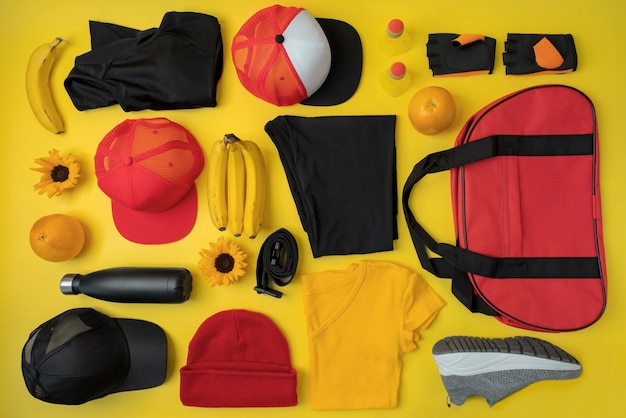 Photo top view of composition with neatly arranged and organized sport items