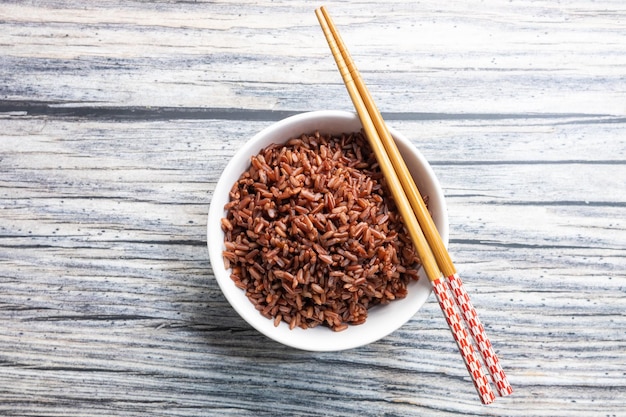 top view cooked rice berry in a white cup