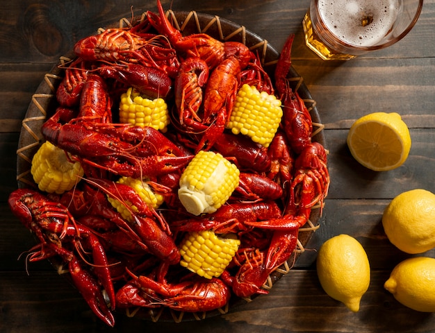 Top view crawfish and lemons still life