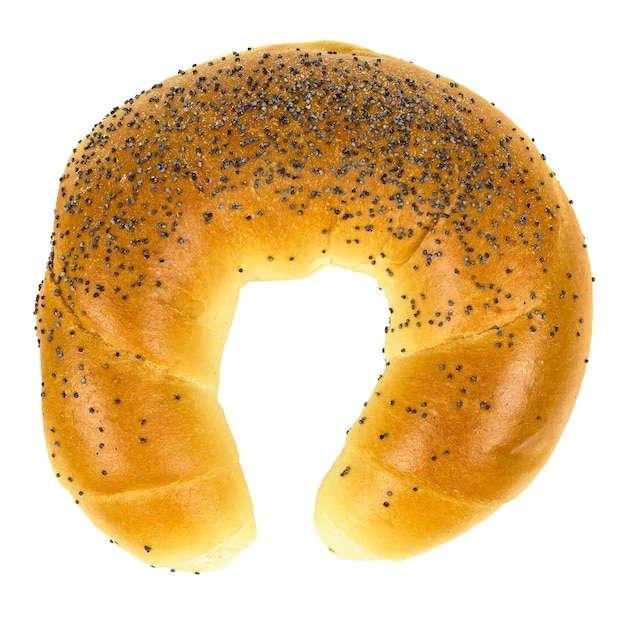 Top view of crescent roll with poppy seeds on white background