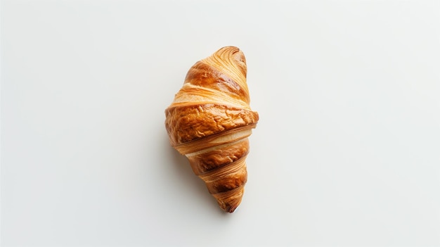 Photo top view of croissant on white background