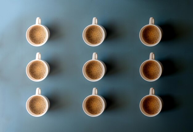 Top view for cup of coffee on green background