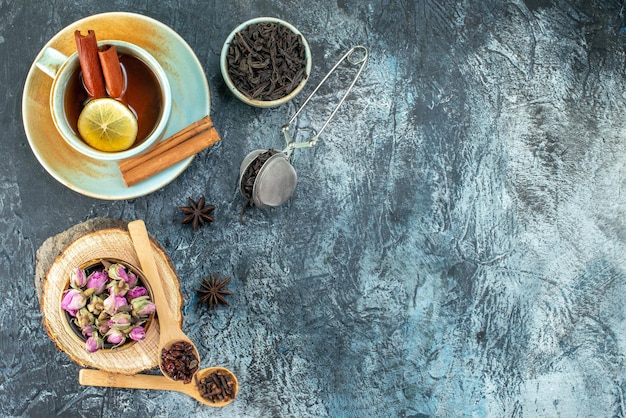 Top view cup of tea with fresh black tea on light background color drink tea fruit water breakfast ceremony photo