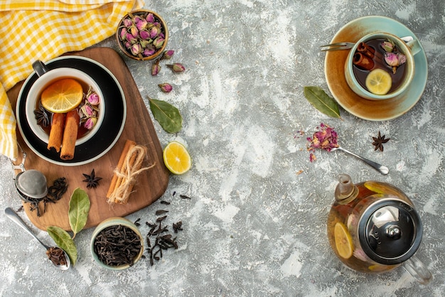 Top view cup of tea with lemon on a light background breakfast flower ceremony morning flavor fruit food color