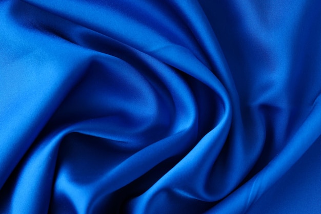 Top view of dark blue fabric cloth texture for background and design art work nice crumpled