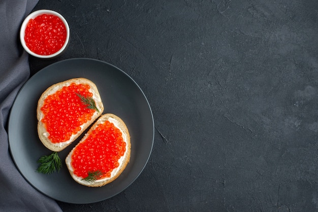 top view delicious caviar sandwiches inside plate on dark surface