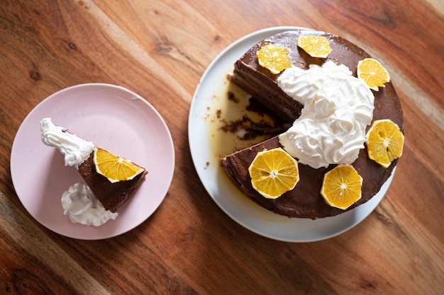 Top view of delicious homemade vegan orange cake served on a plate