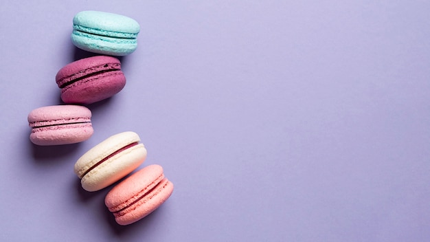 Top view of delicious macarons with copy space