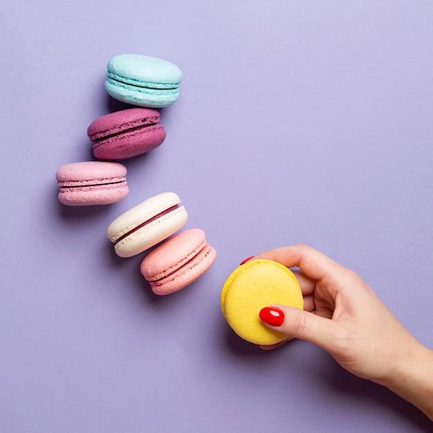 Top view of delicious macarons with copy space