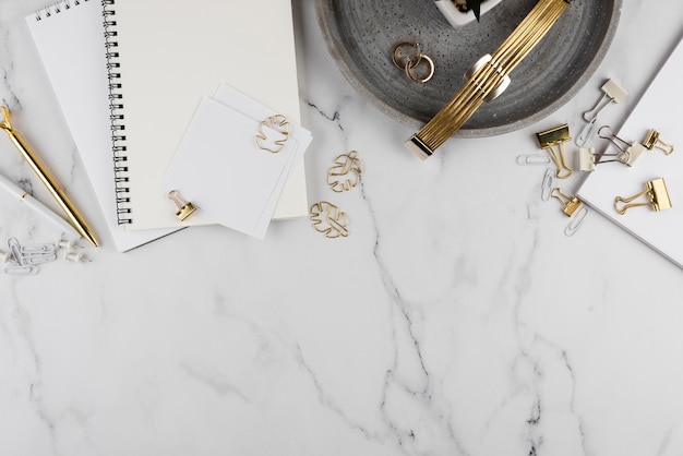 Top view desk items on marble table