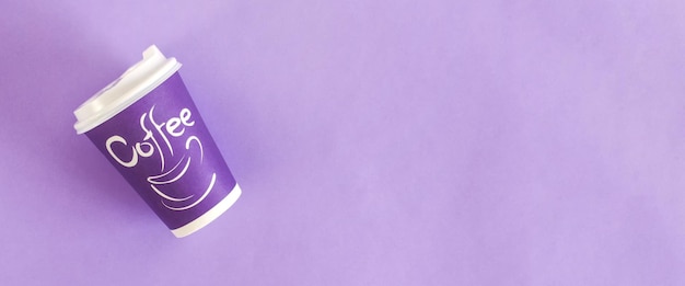 Top view of disposable coffee cups Paper cups On pastel violet background