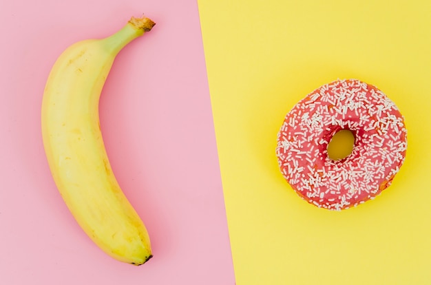 Top view donut vs fruit