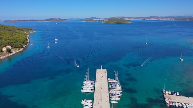 Top view drone above harbor boats and yachts docked in port vacation concept high quality photo