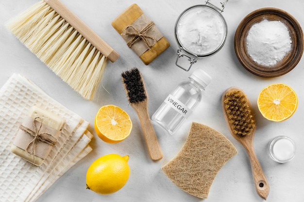 Top view of eco cleaning products and brushes