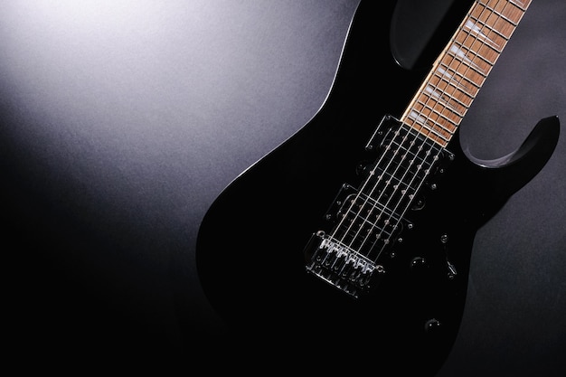 Top view of electric modern black guitar