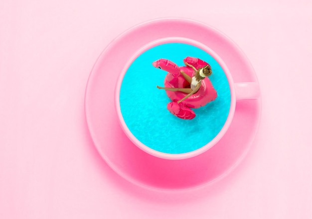 Top view flat lay coffee pink cup on with swimming pool in it Creative art minimal collage