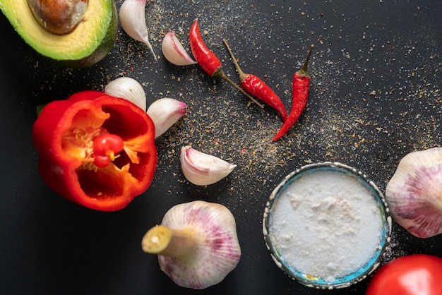 Top view of fresh guacamole ingredients, natural organic vegetables on the table, home cookings