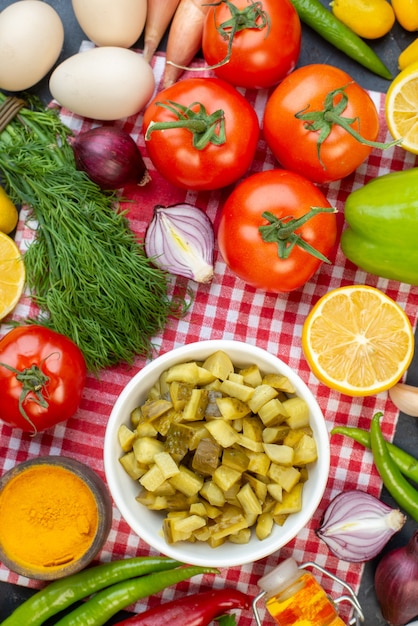 top view fresh sliced pickles with greens and vegetables on the dark background meal lunch snack color salad food health diet