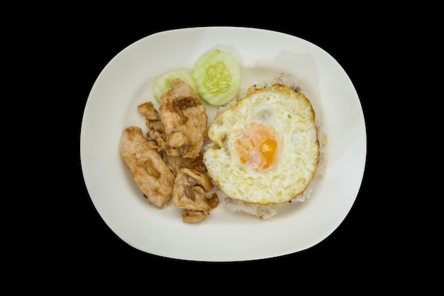 Top view of Fried chicken with garlic and pepper and omelet focus selective