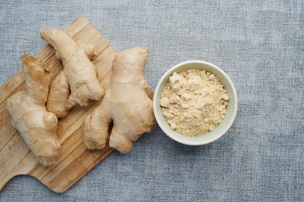 Top view of Gingers and powder on chopping board