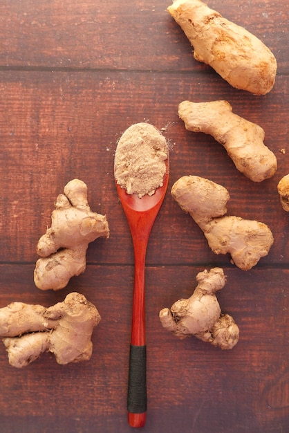 top view of Gingers and powder on wooden table