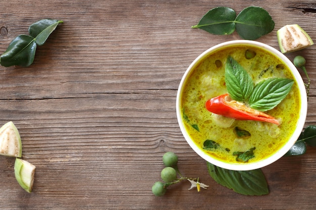 Top view of green curry fish ball in white bowl