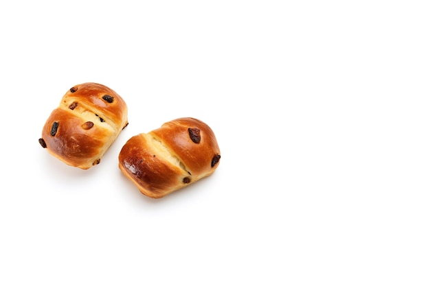 top view a group of buns with raisin toppings isolated on solid white background with copy space