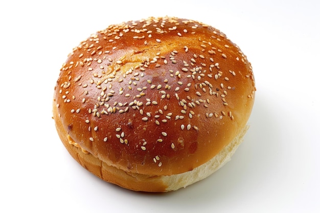 Top view of hamburger bun with sesame seeds on white background