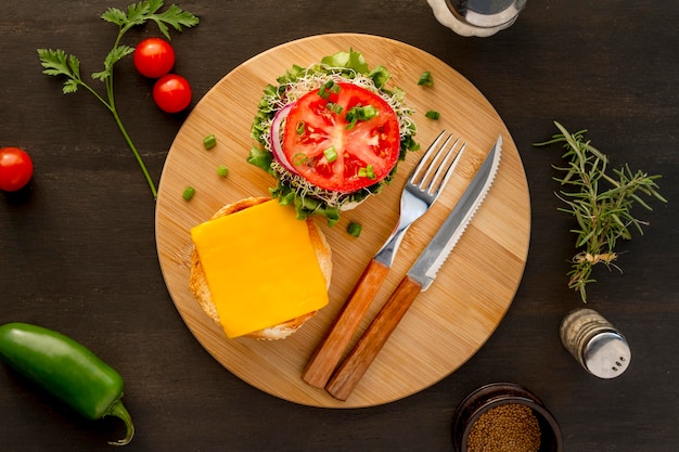 Top view hamburger and cutlery