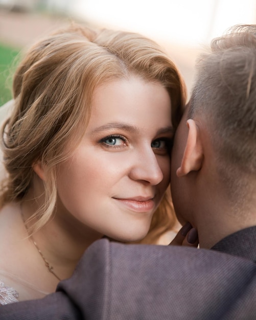 Top view. happy bride and groom sitting on a bench . holidays and events