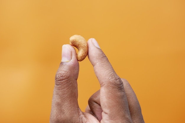 Top view of holding a cashew nut