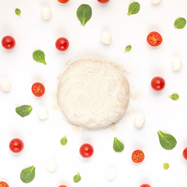 Top view ingredients and dough for pizza