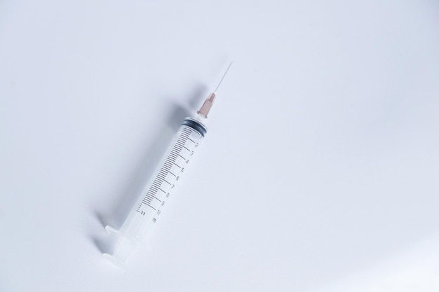 Top view of injection on white background with copy space.