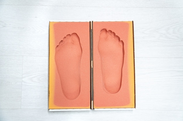 Top view of a insoles mold with a patients footprints