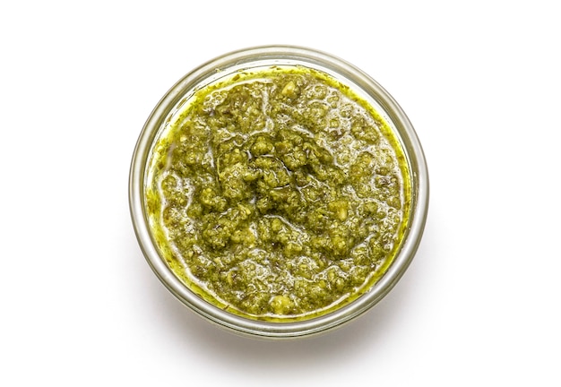 Top View of Italian Sauce Pesto or bowl of Basil Pesto isolated on white 