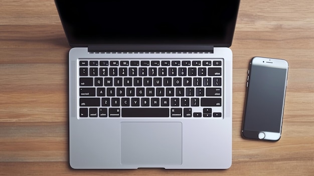 Top view of laptop smartphone and coffee cup on wooden table