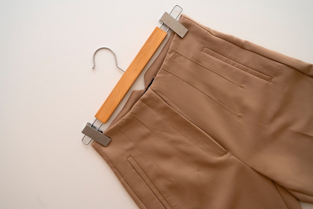 Top view light brown beige pants still life