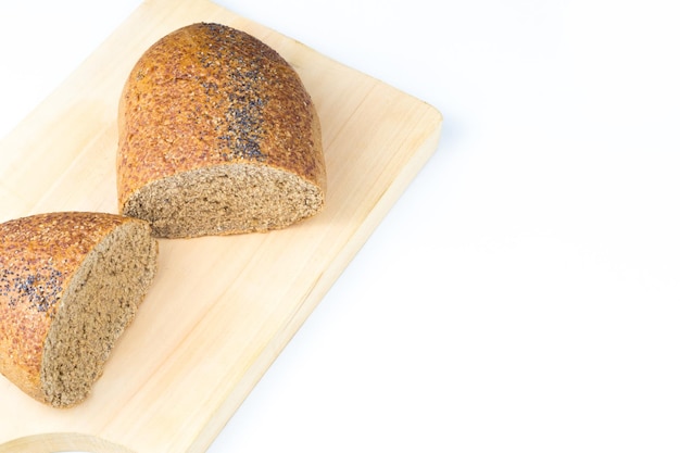 Top view meal organic wholemeal bread with oats and wheat in the dining room