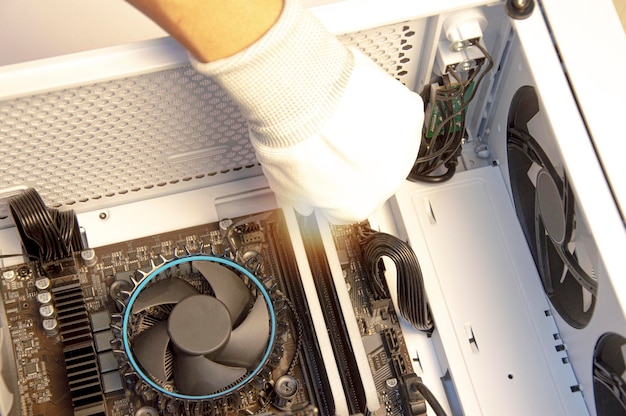 Top view mechanic checking computer