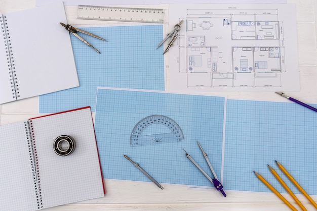 Top view of millimeter paper with house plan