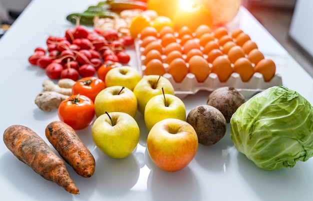 Top view of mixed vegetables. Reddish in front. Organic food concept. Stay healthy. Fresh products consuming.