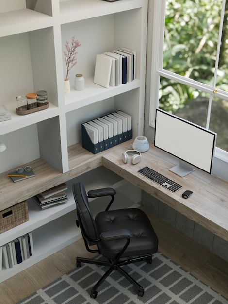 Top view of a modern home office interior design with computer mockup on table