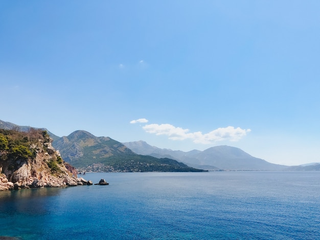 top view montenegro sutomore stones beach blue turquoise adriatic sea water mountains day. aerial