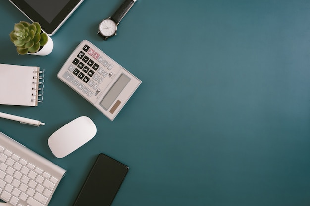 Top view of an office desk workspace