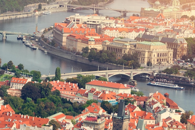 Top view of the old beautiful city with the river and bridges Toned