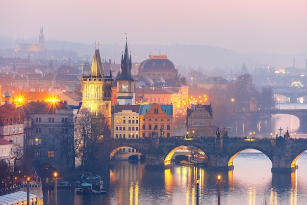 Top view over old town and bridges over vltava river at night in prague czech republic