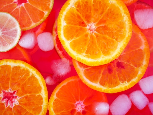 Top view of orange slices in fruit syrup