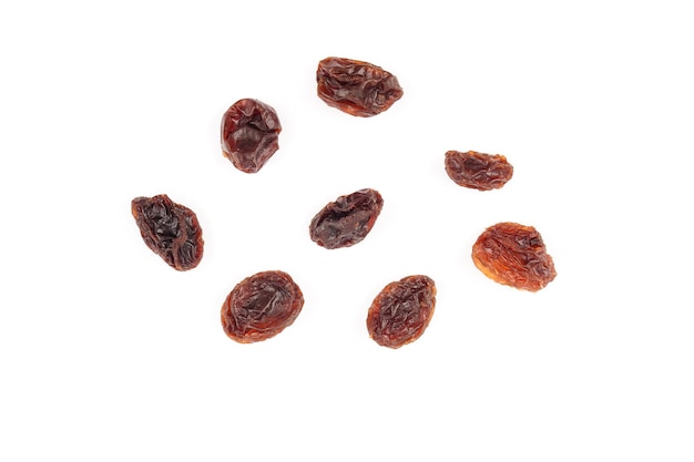 Top view of organic dried Raisins on white background