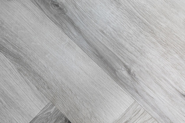 Top view of a parquet floor under natural light Wooden pattern with oak diagonal texture